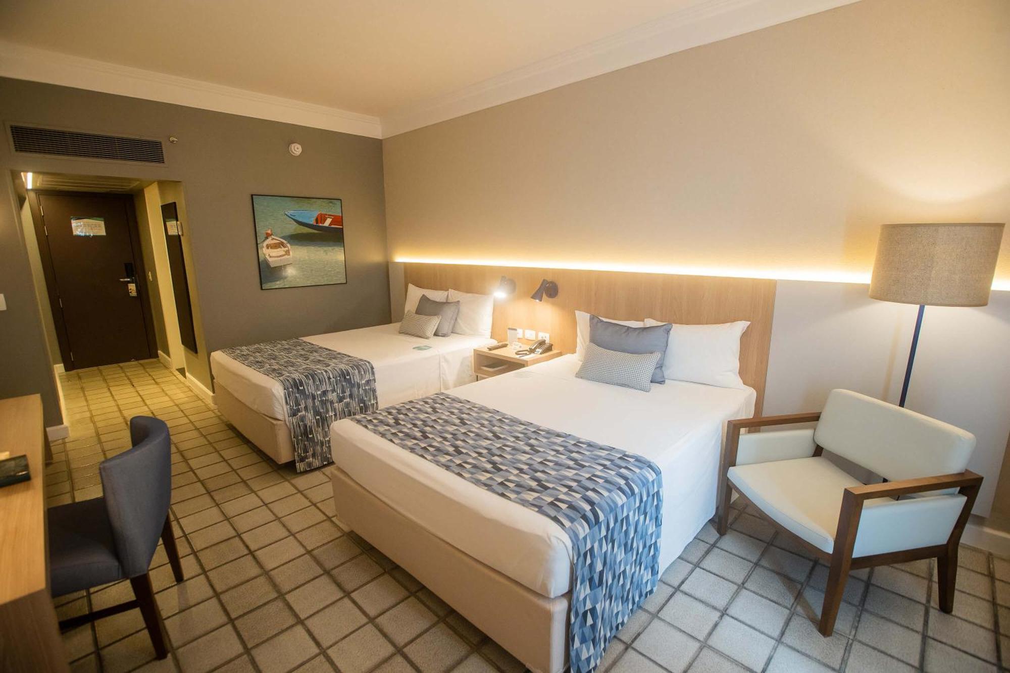 Hotel Deville Prime Salvador Kültér fotó A room at the hotel