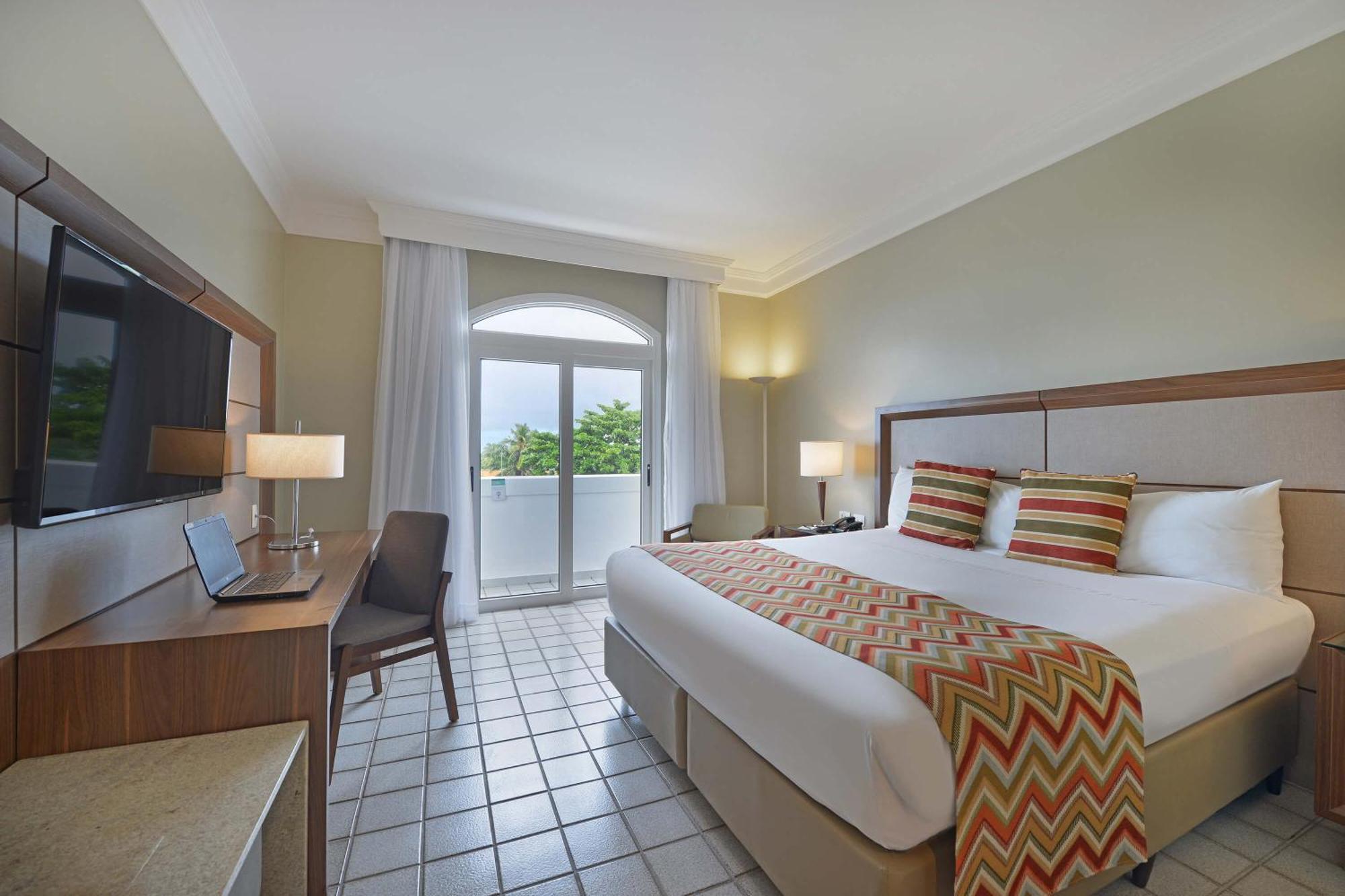 Hotel Deville Prime Salvador Kültér fotó A room at the hotel