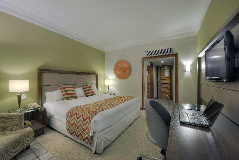 Hotel Deville Prime Salvador Kültér fotó A room at the hotel